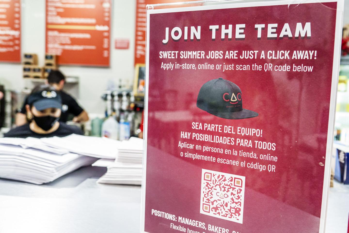 Now hiring sign at a bakery in Miami Beach, Florida