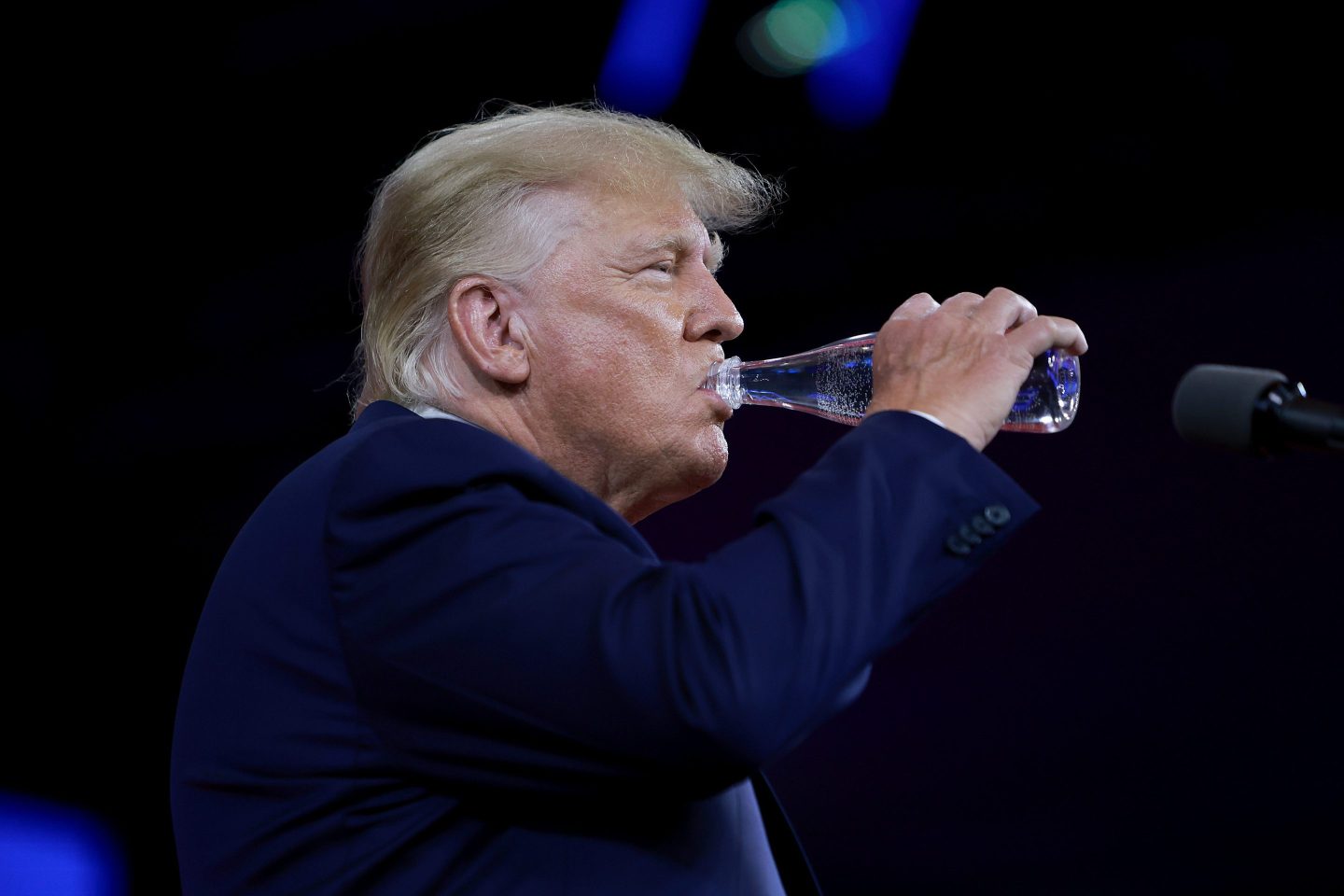 Former U.S. President Donald Trump drinks from a bottle as he gives a speech during the Conservative Political Action Conference (CPAC) at The Rosen Shingle Creek on Feb. 26 in Orlando, Florida. CPAC, which began in 1974, is an annual political conference attended by conservative activists and elected officials.