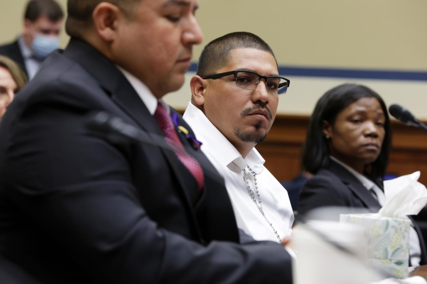 Miguel Cerrillo (C), the father of Miah Cerrillo a fourth-grade student at Robb Elementary School in Uvalde, Texas.
