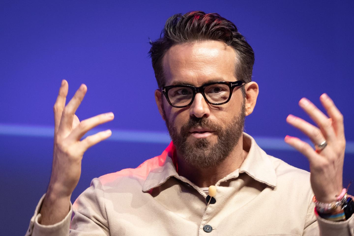 Ryan Reynolds speaks on stage