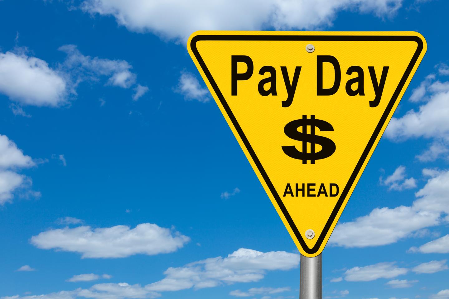 Pay Day Ahead Road Sign.