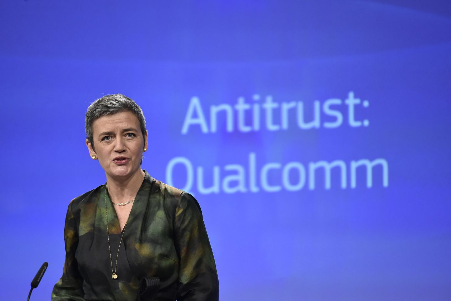 EU Competition Commissioner Margrethe Vestager gives a joint press conference at the EU Headquarters in Brussels, on January 25, 2018 as the EU hit US chipmaking giant Qualcomm with an antitrust fine of 997 million euros ($1.2 billion) for paying Apple to use its chips exclusively in iPhones and iPads.