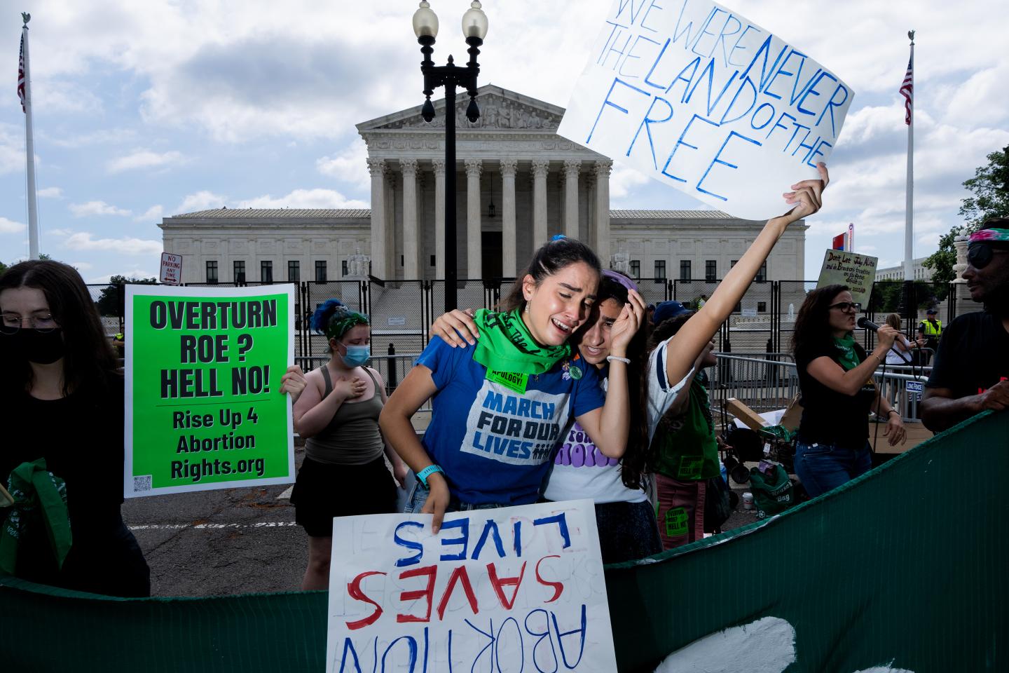 ‘Abortion on demand & without apology’: pro- and anti-choice activists react with tears outside Supreme Court on the day it overturned Roe v. Wade