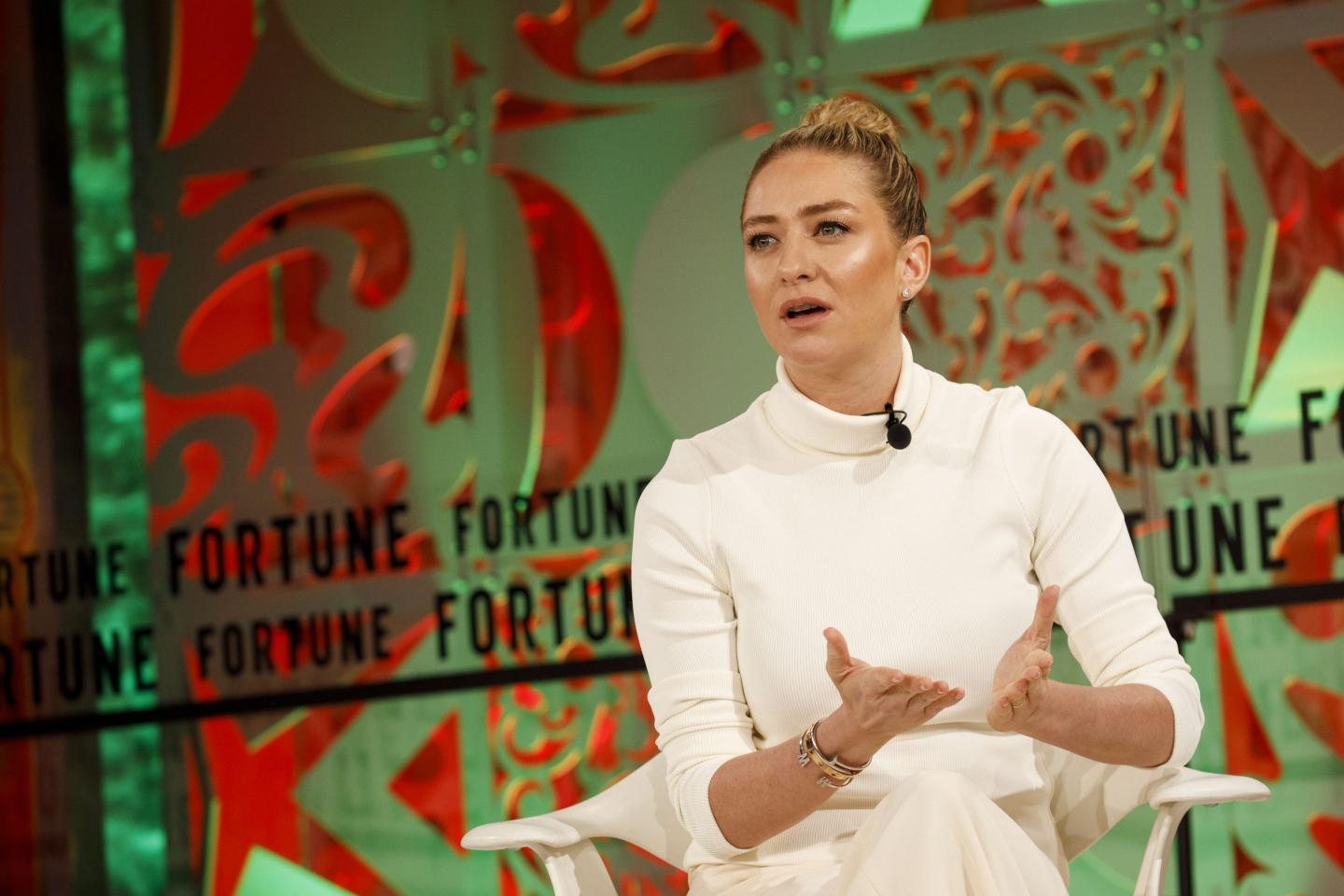 Whitney Wolfe Herd, CEO of Bumble, speaks at a conference.