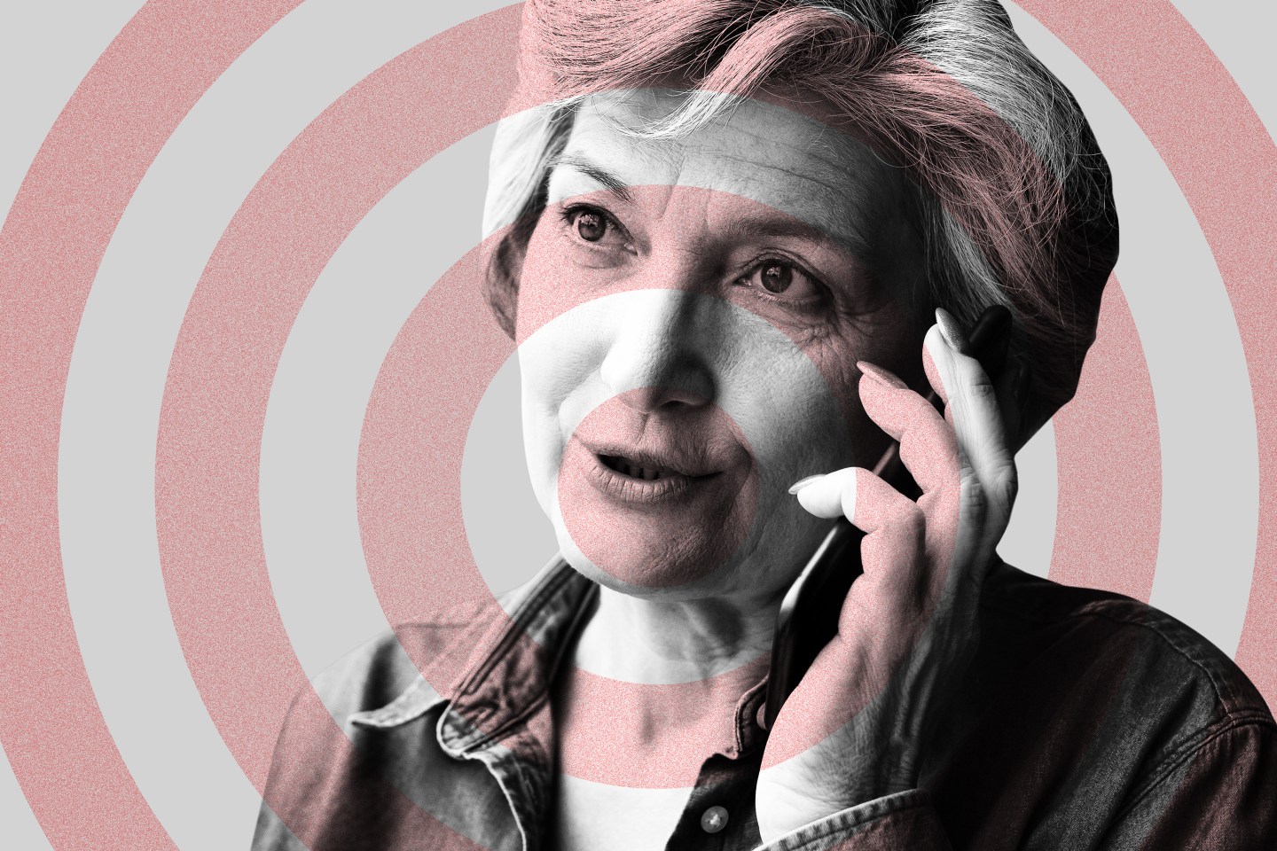 An older woman talking on the phone