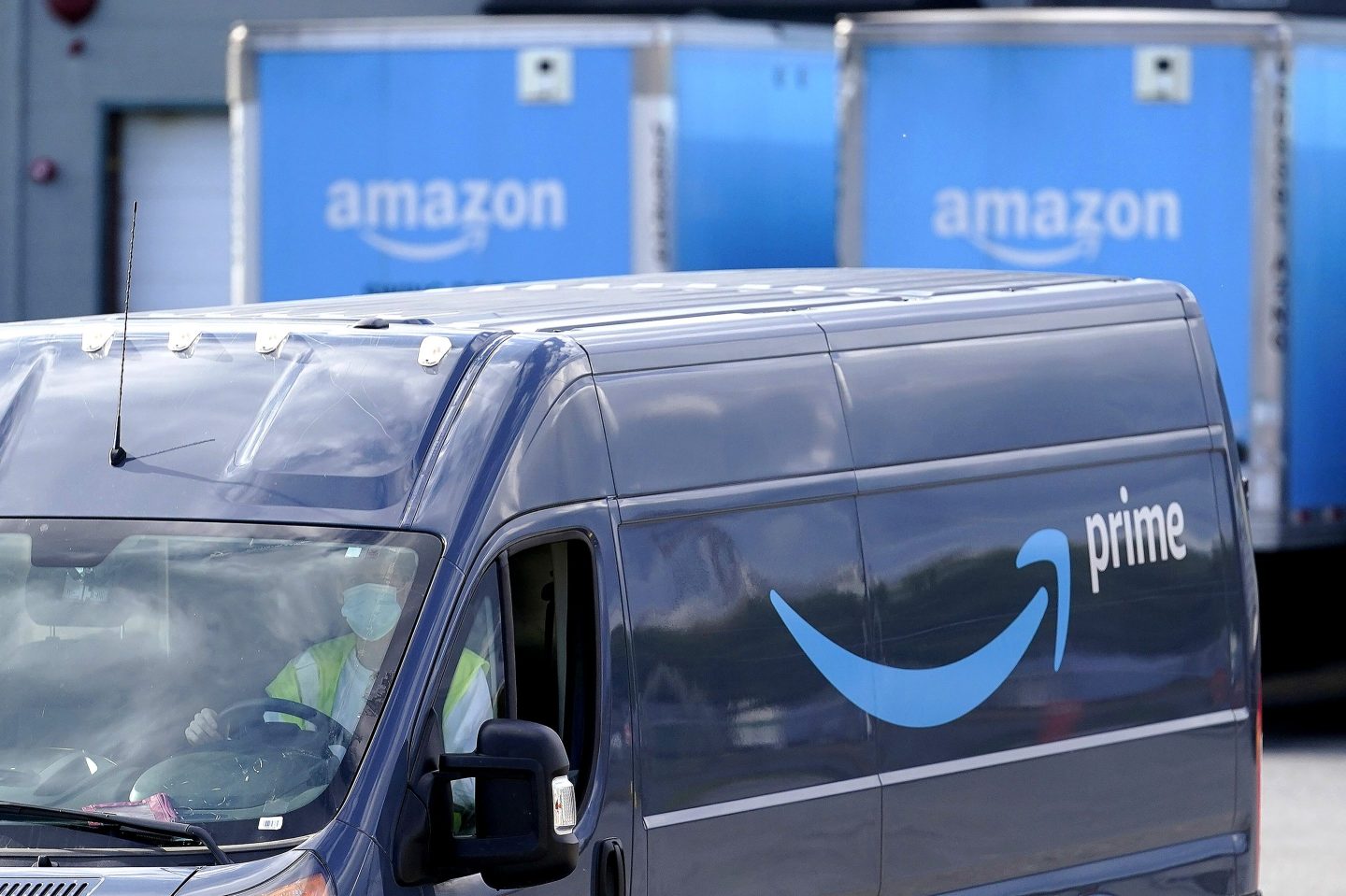 An Amazon van departs an Amazon Warehouse location on Oct. 1, 2020, in Dedham, Mass.