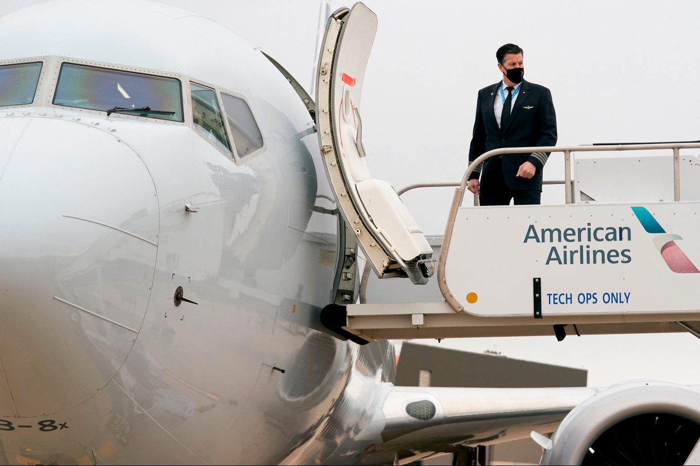 American Airlines pilot boarding plane.