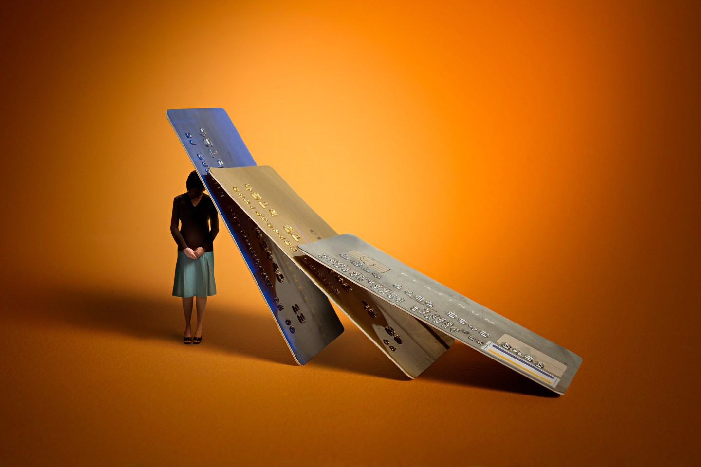 Woman being crushed by credit card debt