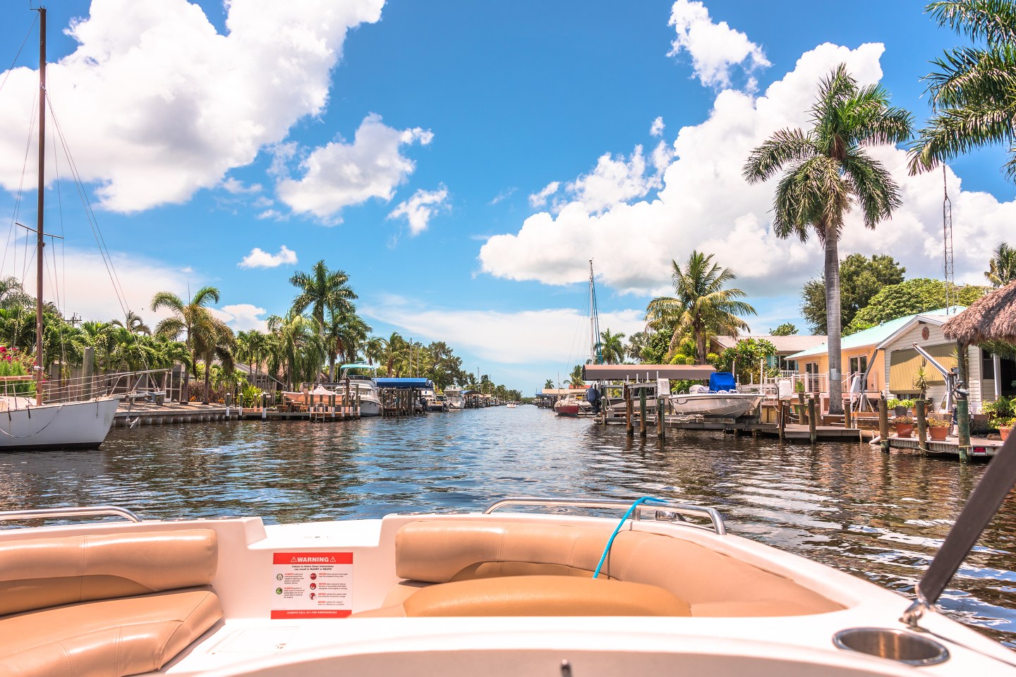 A boat on the canal of Cape Coral, Florida.
