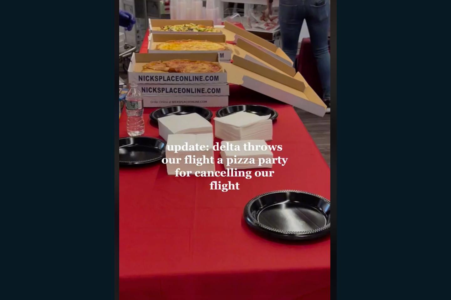 Delta gave passengers pizza after delaying their flight as all airlines struggle with massive staffing shortages