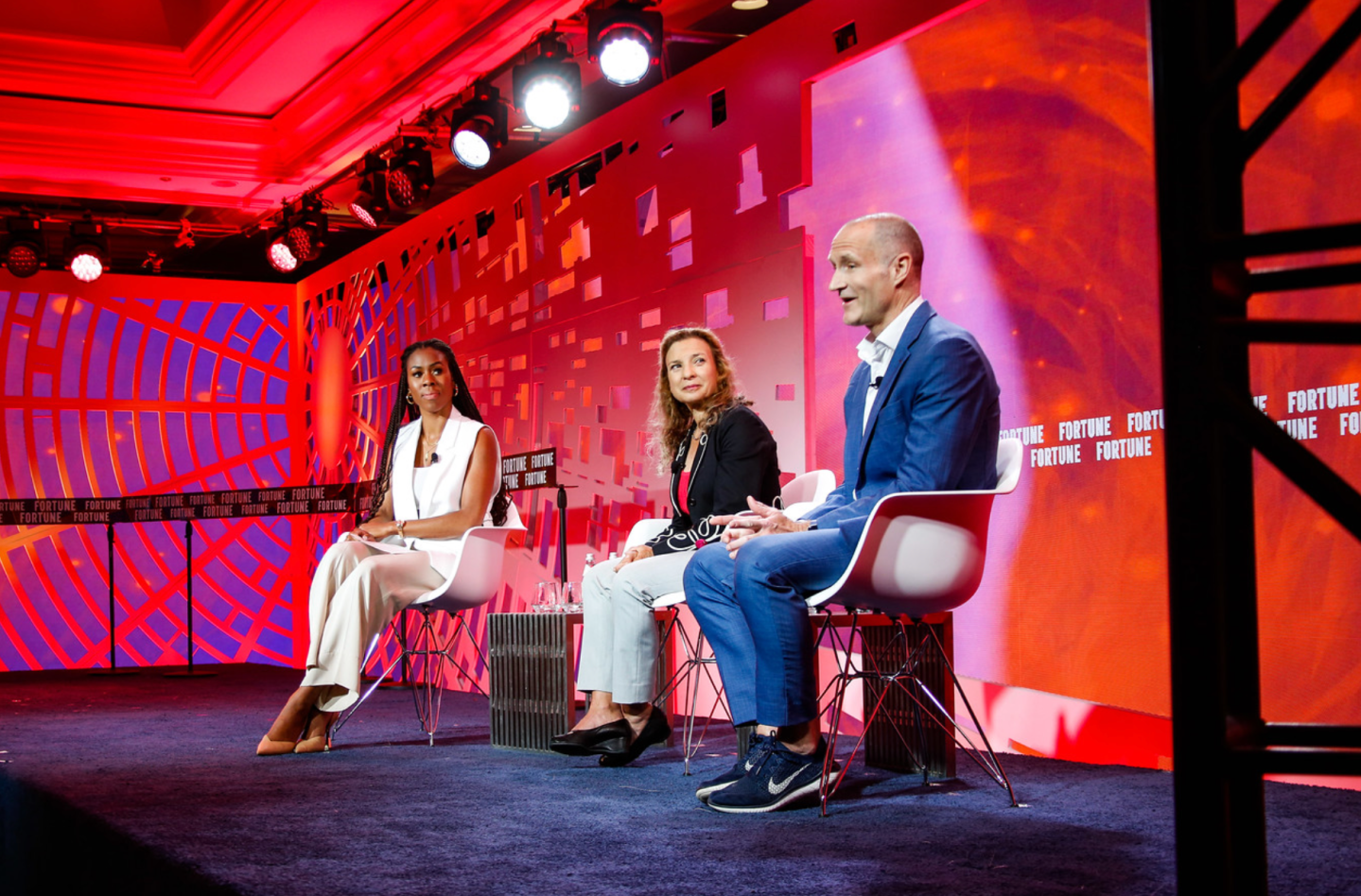 Terri Burns of GV (left) talks with panelists Lise Buyer, partner at Class V Group, (center) and Gene Munster, managing partner at Loup Funds (right) during Fortune Brainstorm Tech in Aspen, Colo.