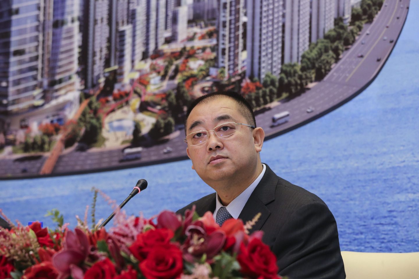 Photo of former Evergrande CEO Xia Haijun at a press conference in Hong Kong on August 28, 2017.