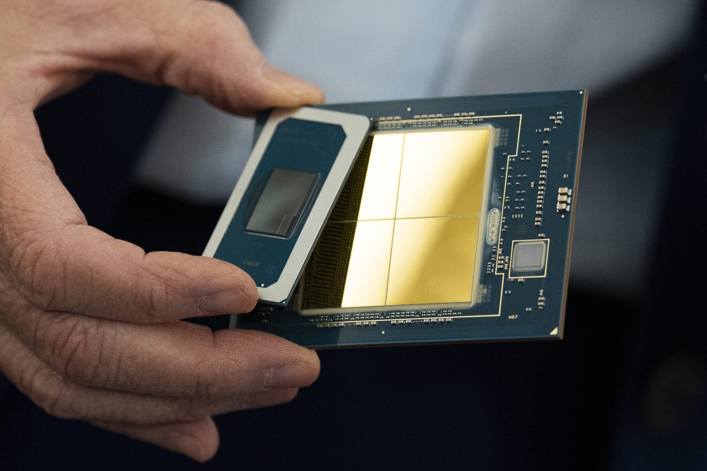 Senator Maria Cantwell holds a model of a computer chip