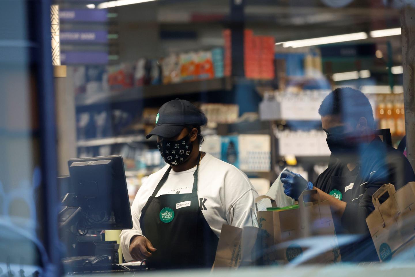 Workers at a food market