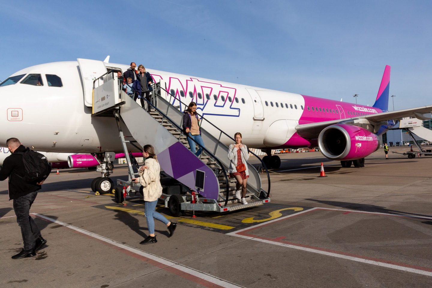 Wizz Air passengers disembark at London's Luton Airport in May.