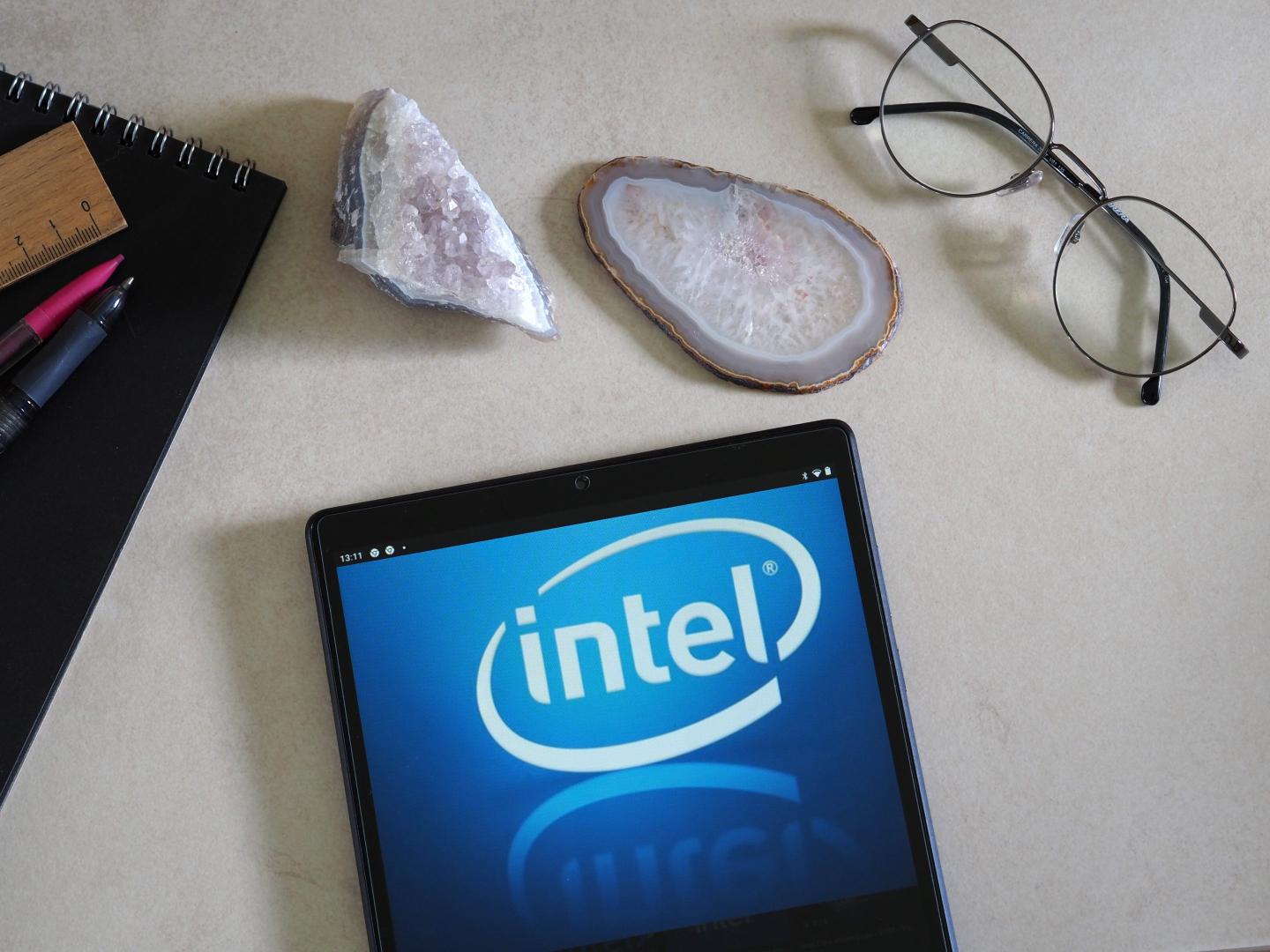 A tablet with an Intel logo on a desk.