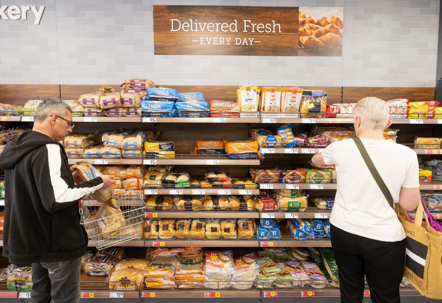 Grocery store shoppers.
