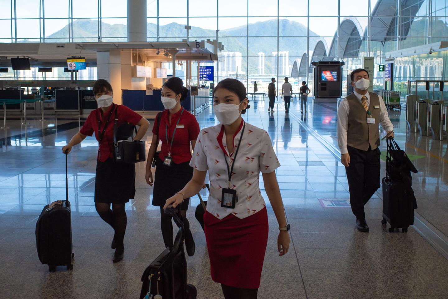 Cathay flight attendants in Hong Kong's airport