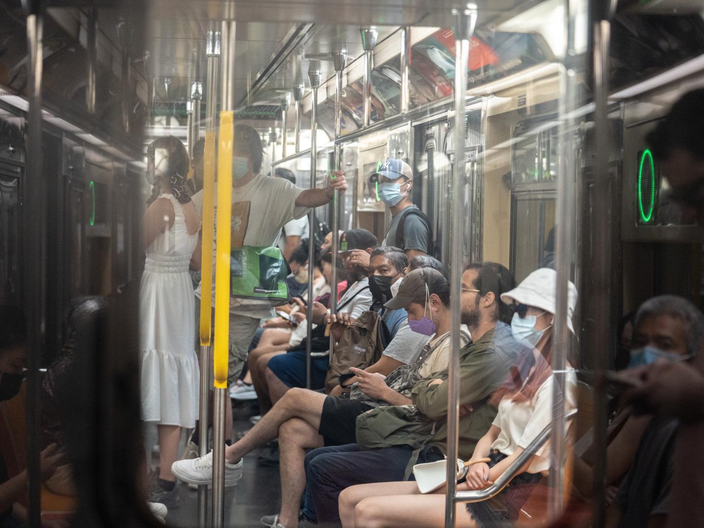 Commuters ride a subway in New York City on June 30. New Omicron subvariant BA.5 is estimated to have caused nearly 54% of COVID infections in the U.S. last week.