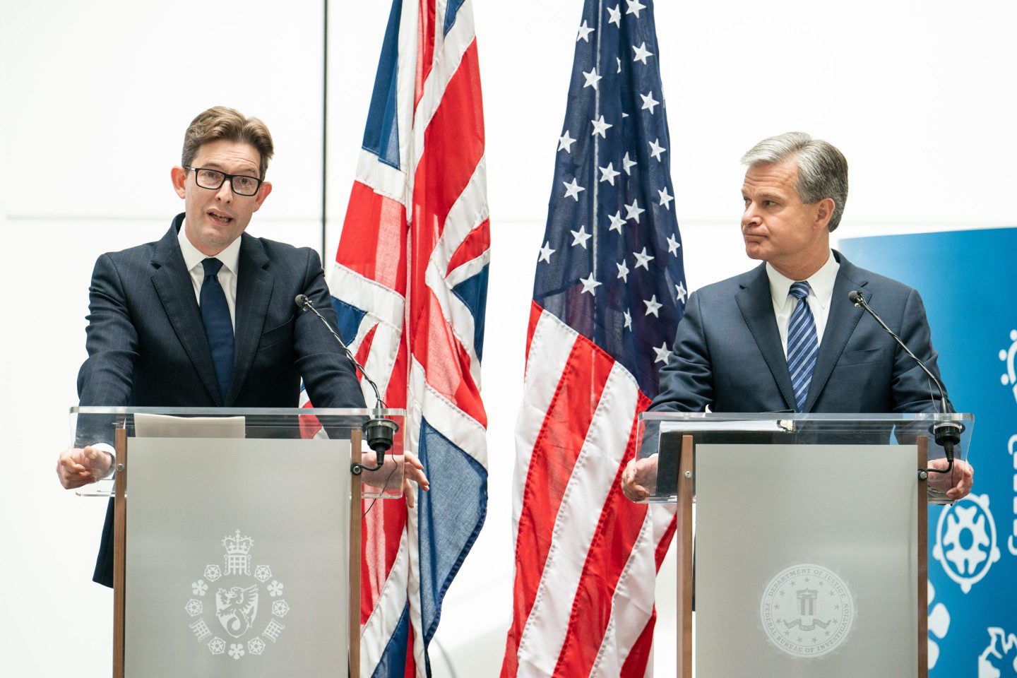 MI5 Director General Ken McCallum (left) and FBI Director Christopher Wray at a joint press conference at MI5 headquarters, in central London on July 6, 2022. 
