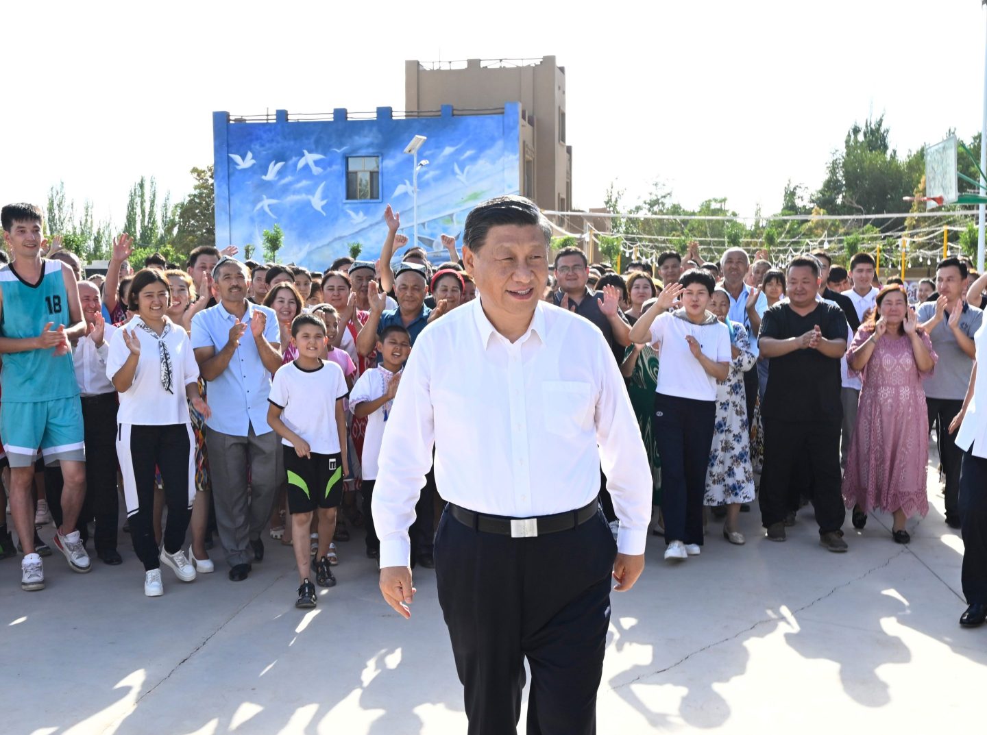 Chinese President Xi Jinping, also general secretary of the Communist Party of China Central Committee and chairman of the Central Military Commission, inspects a local village in Turpan, northwest China's Xinjiang Uygur Autonomous Region, July 14, 2022.