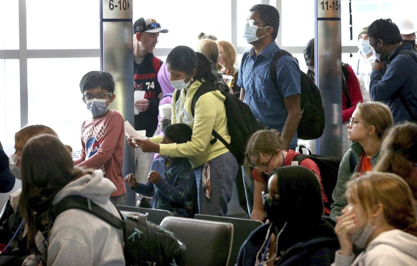 People waiting for a flight at the Chicago Midway Airport.
