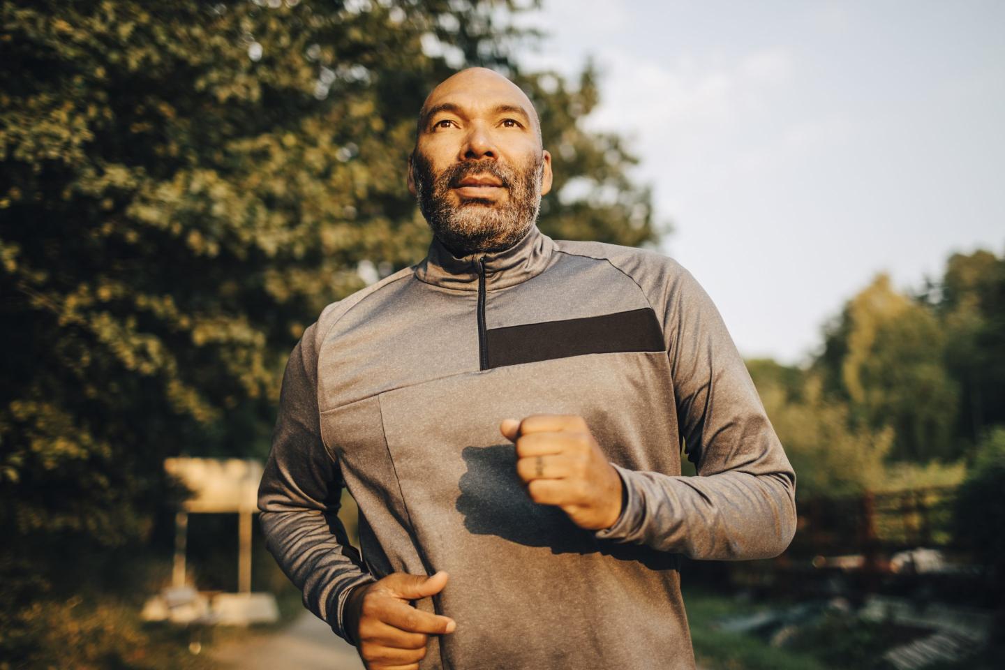 man jogging in a park