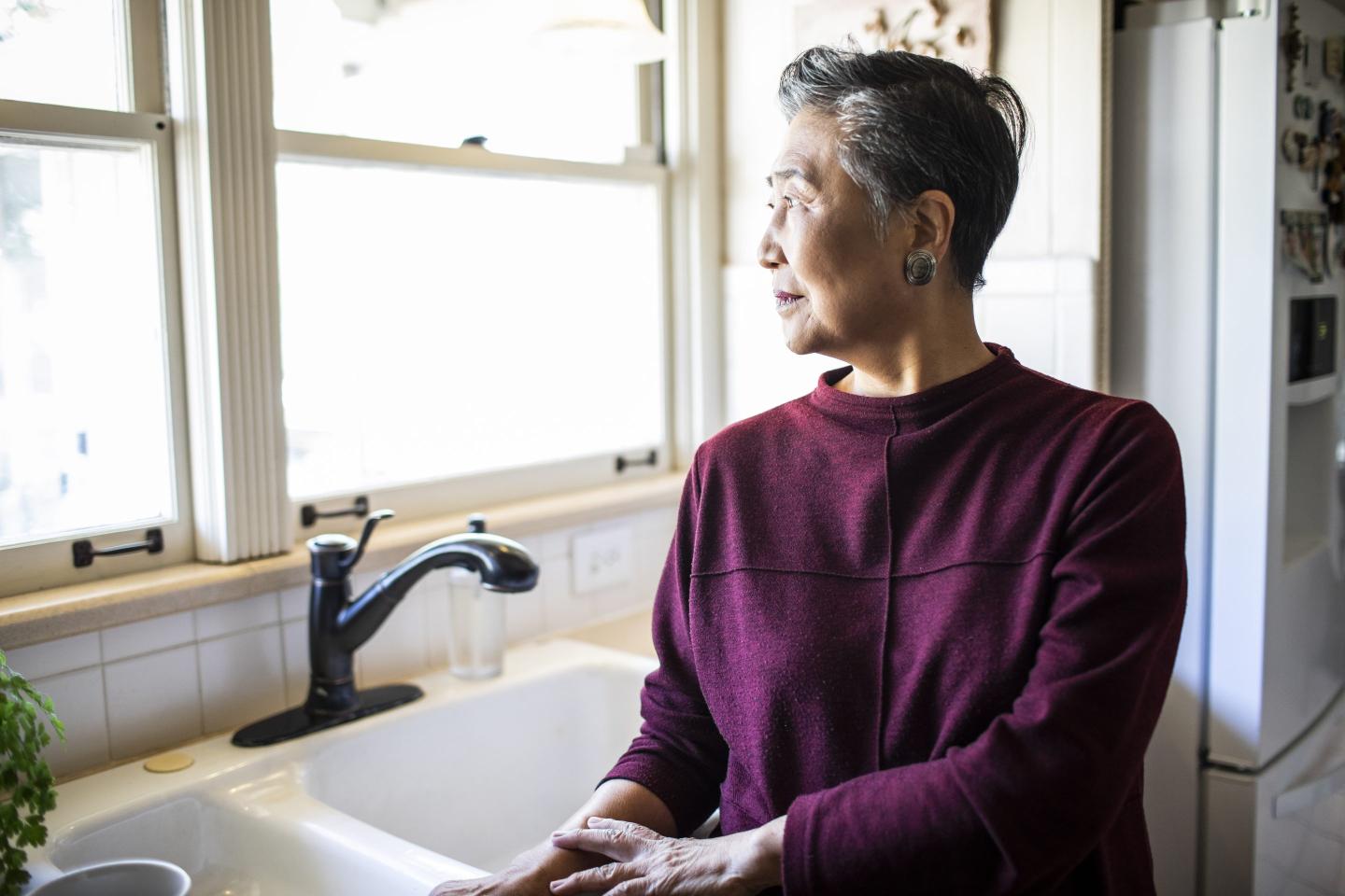 Elderly woman in kitchen