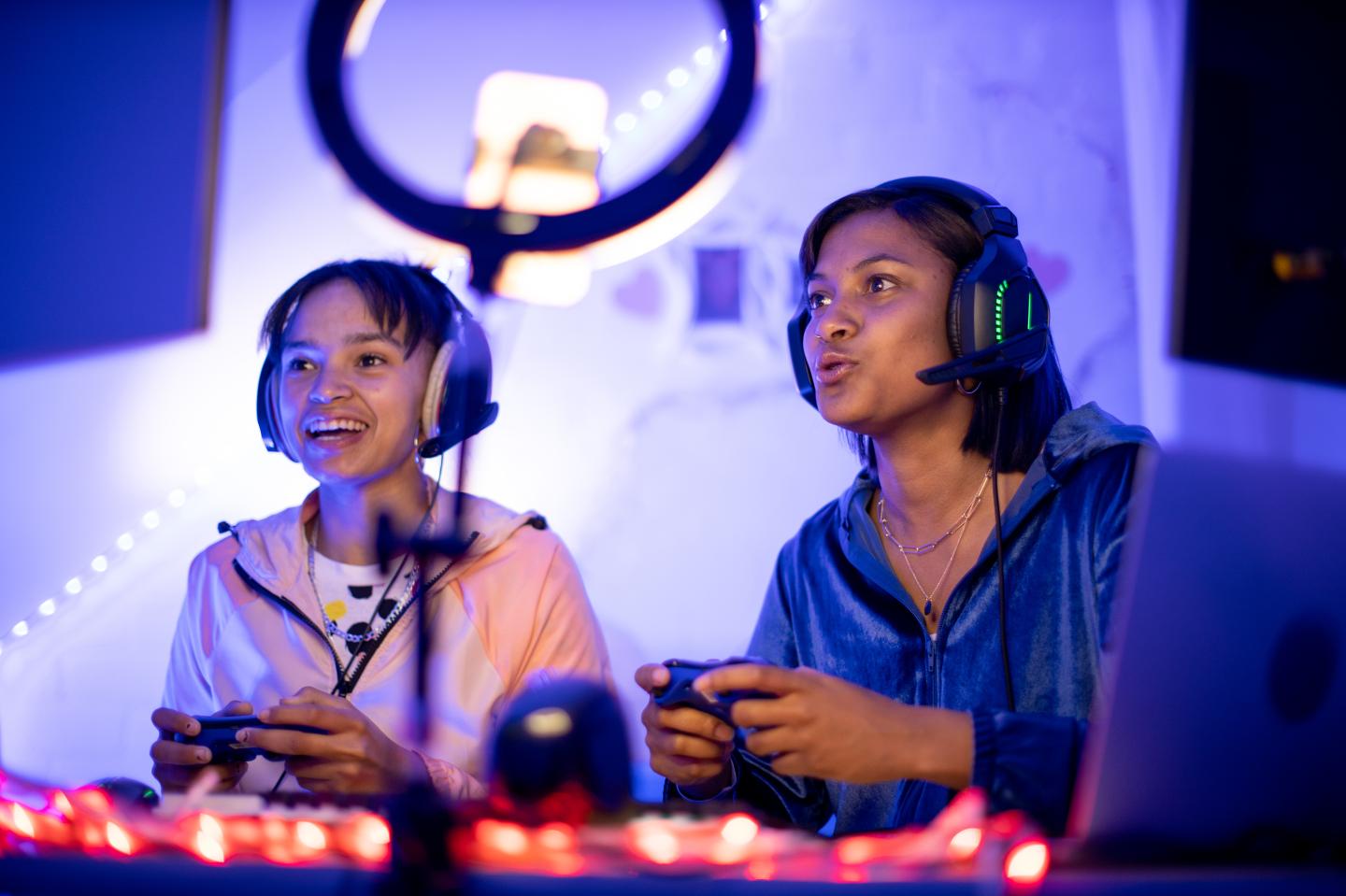 Two young people playing video games.