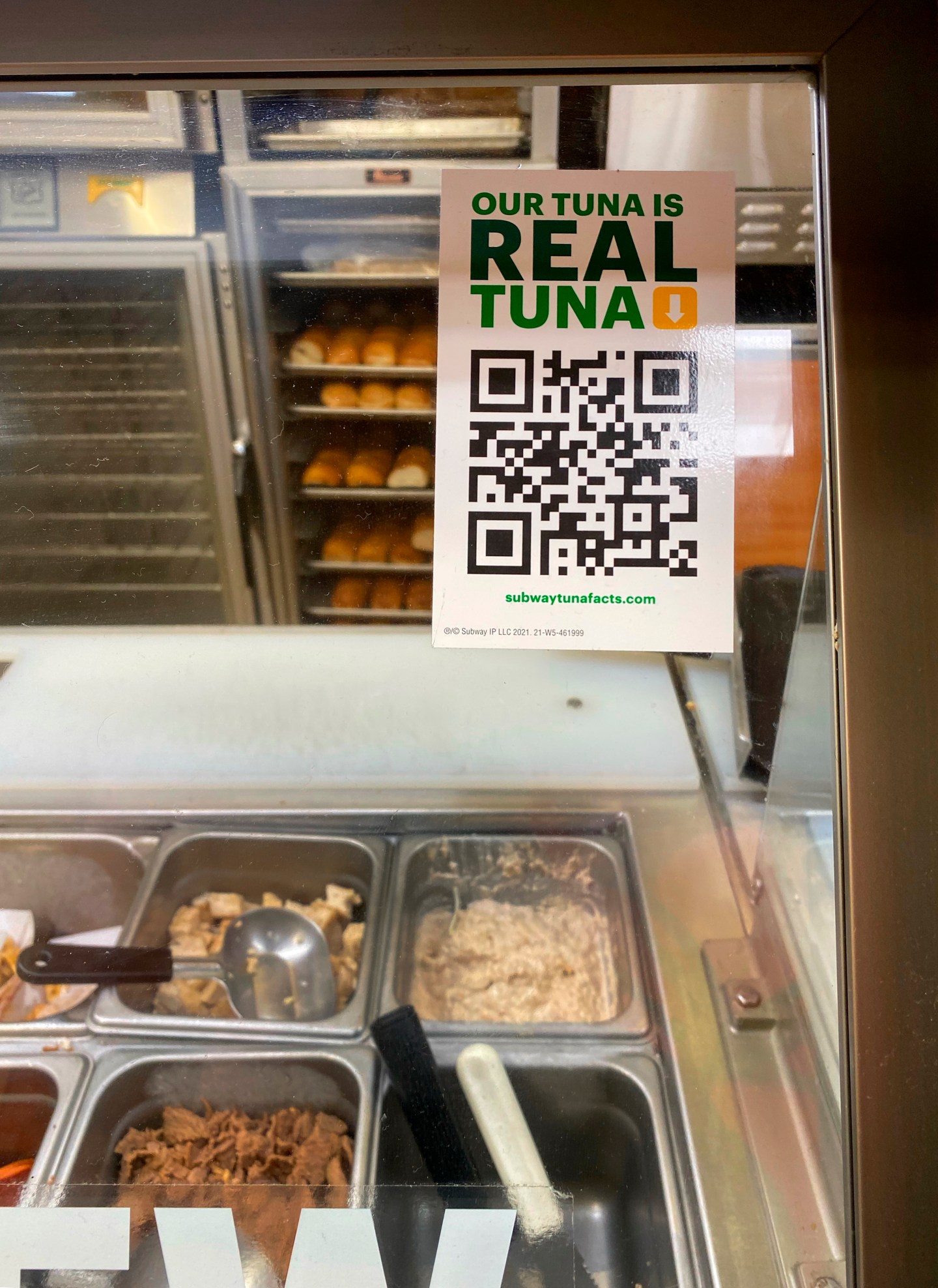 A QR code for Subway's Real Tuna facts page in a Subway restaurant