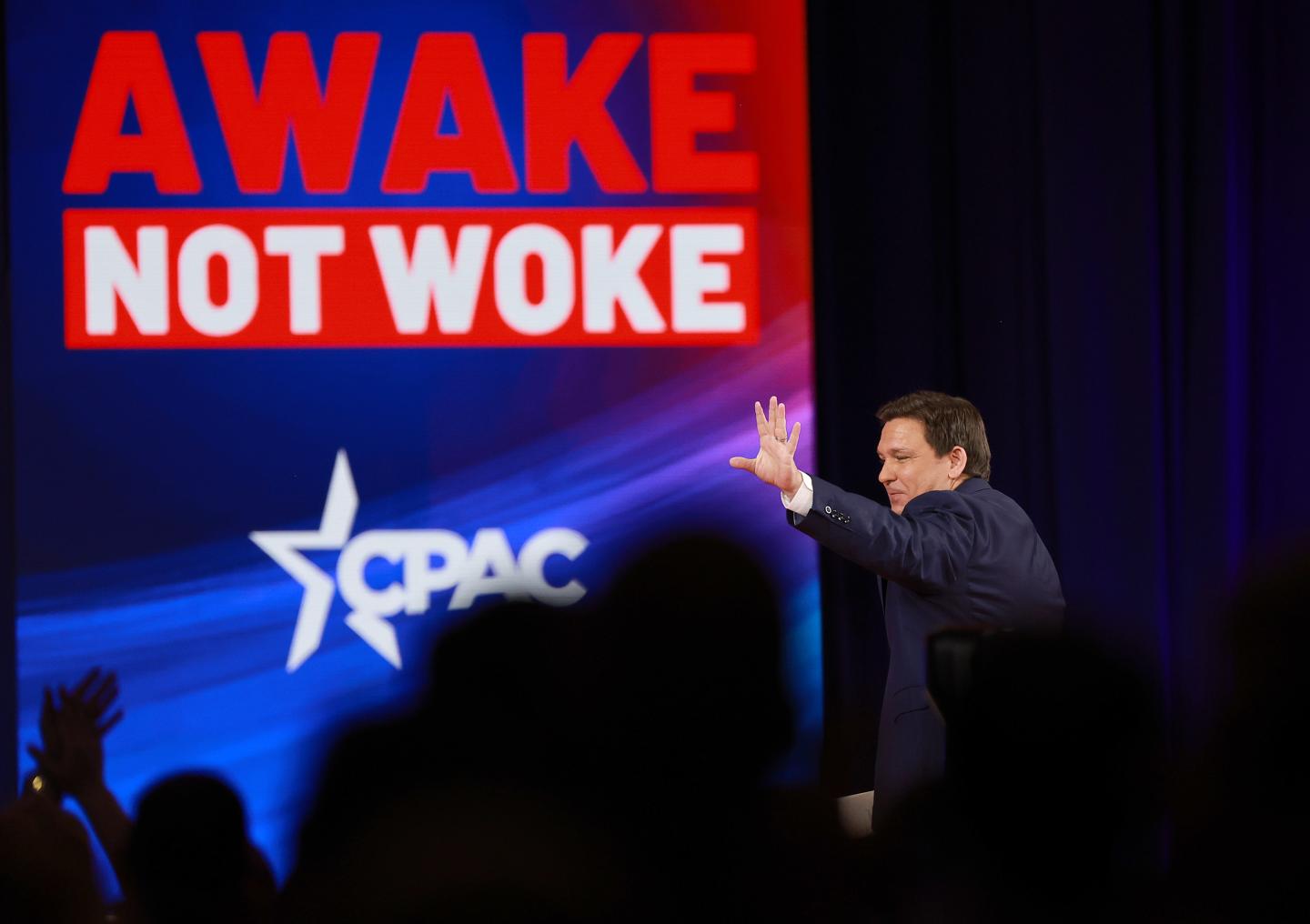 Florida Gov. Ron DeSantis waves to the crowd from the stage at the Conservative Political Action Conference