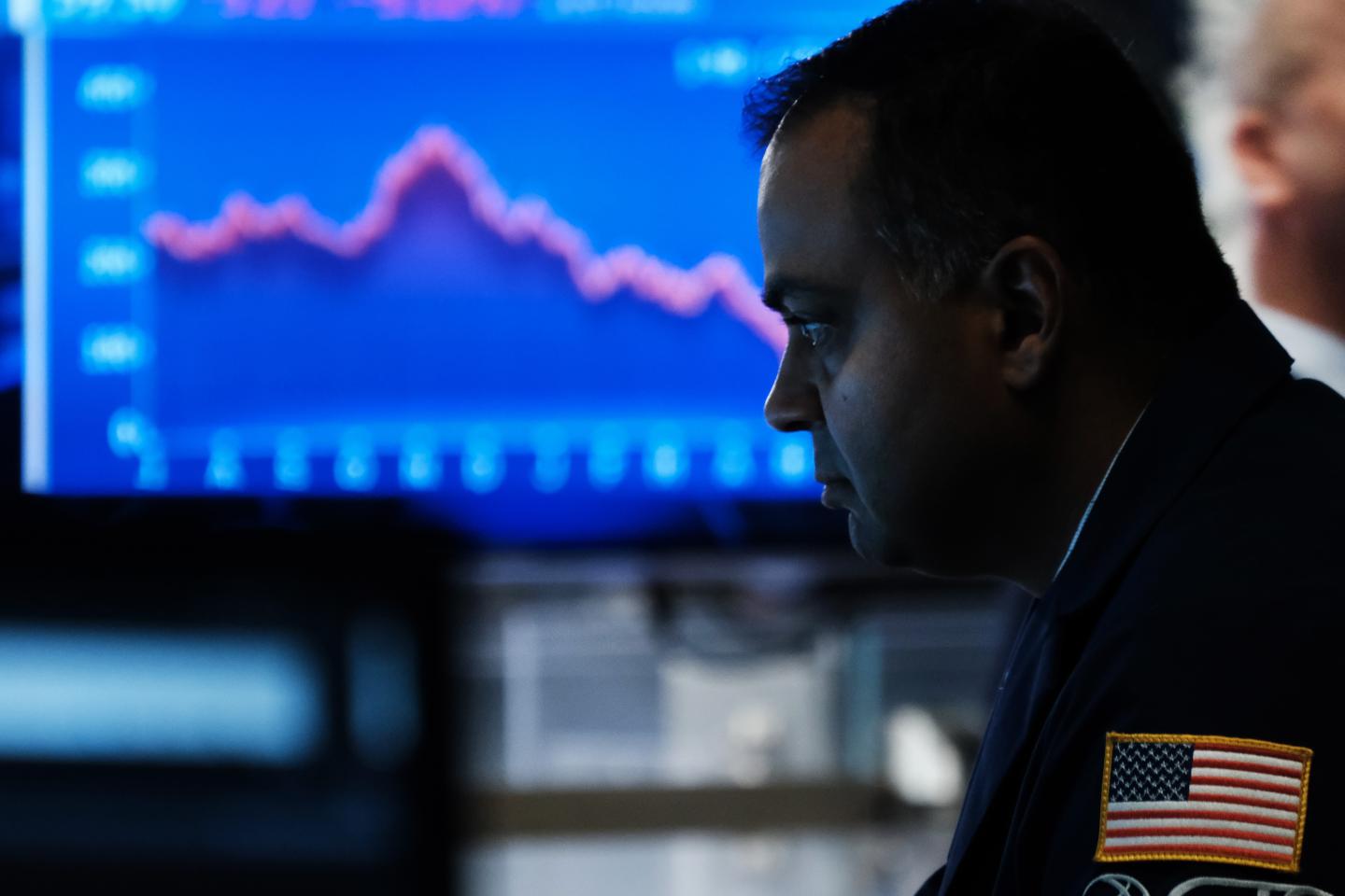 Traders work on the floor of the New York Stock Exchange (NYSE) on June 27, 2022 in New York City.