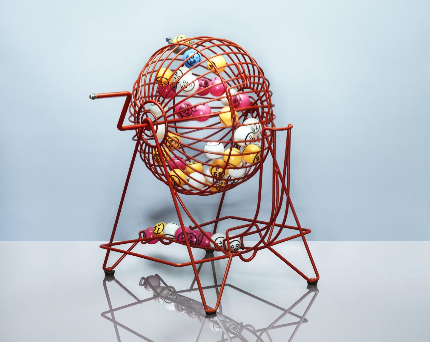 A lottery machine filled with balls. .