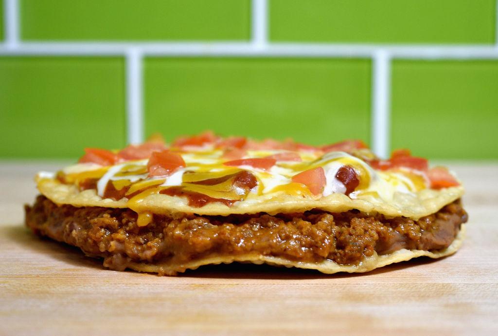 The Taco Bell Mexican Pizza is coming back as a permanent menu item in mid-September, CEO says