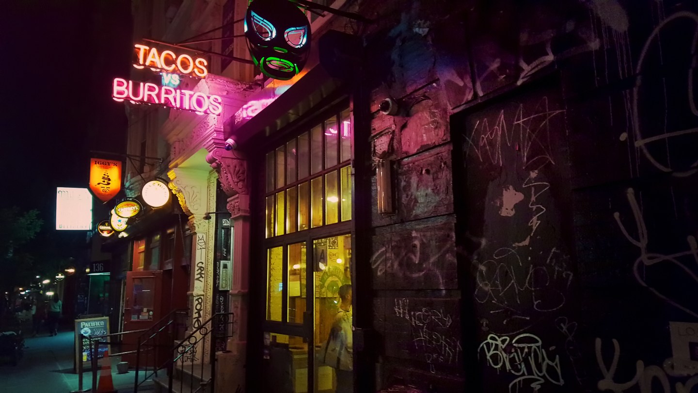 Neon sign of tacos and burritos restaurant in the Lower East Side, Manhattan, New York City