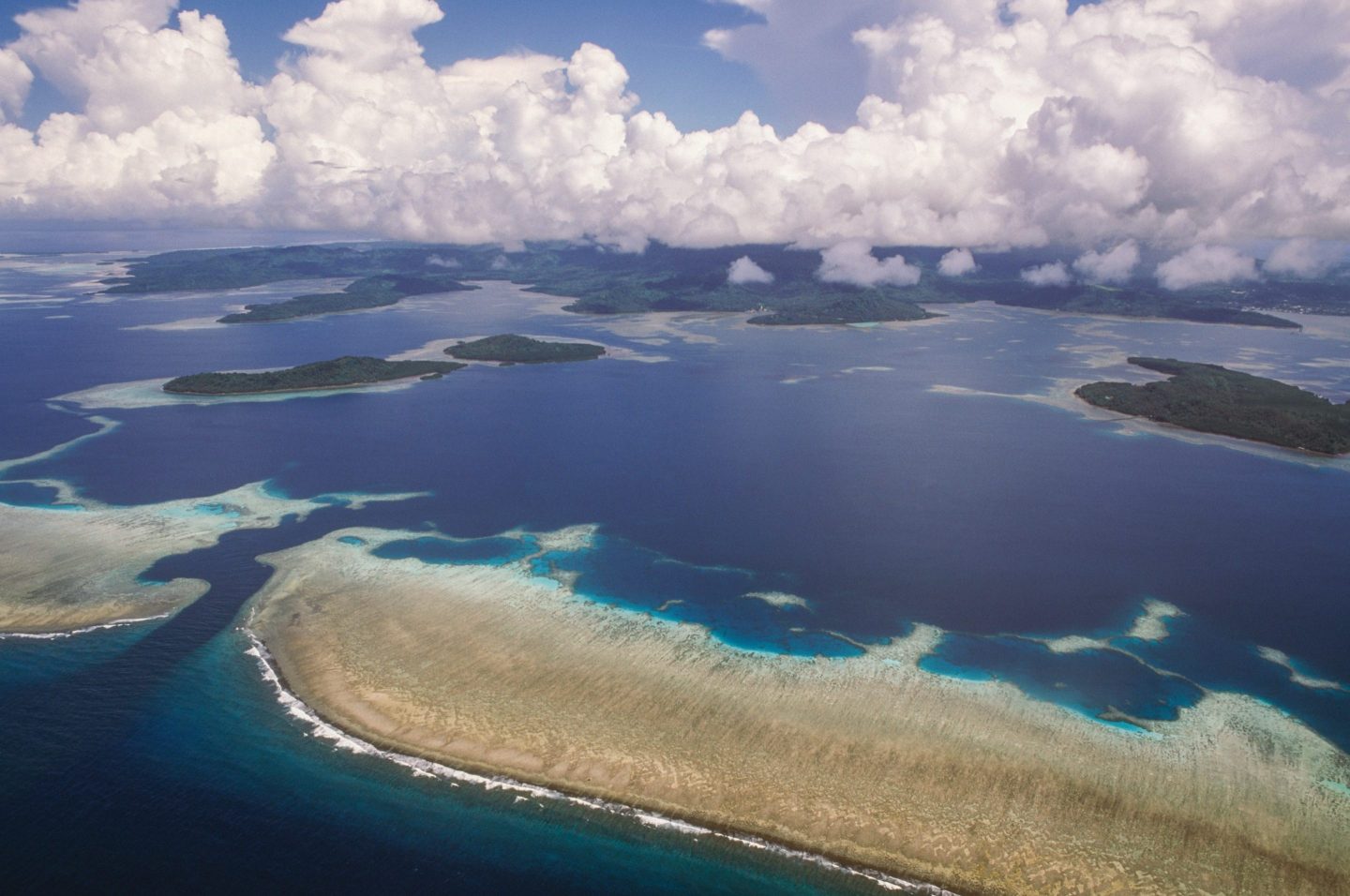 An aerial shot of a coral reef in Pohnpei Island in the Federated States of Micronesia