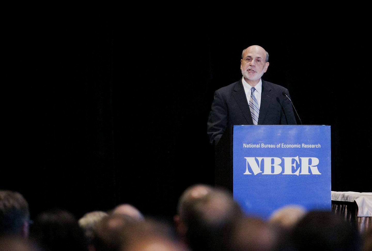 Former Fed Chair Ben Bernanke gives a speech at a 2013 NBER conference.