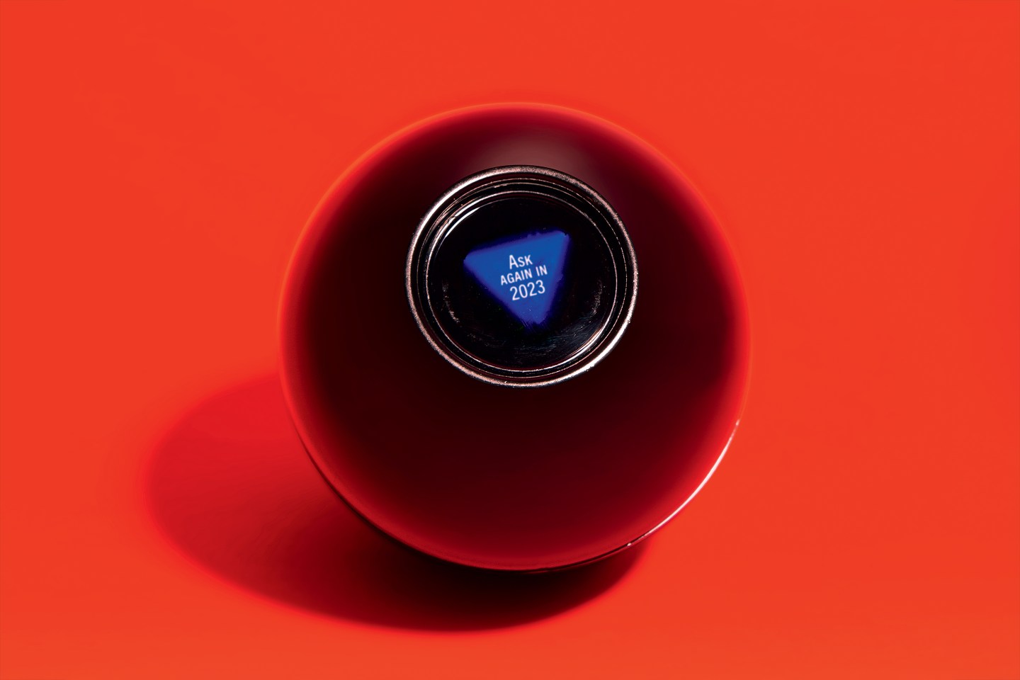 Photo illustration of magic eight ball saying 'Ask again in 2023.'