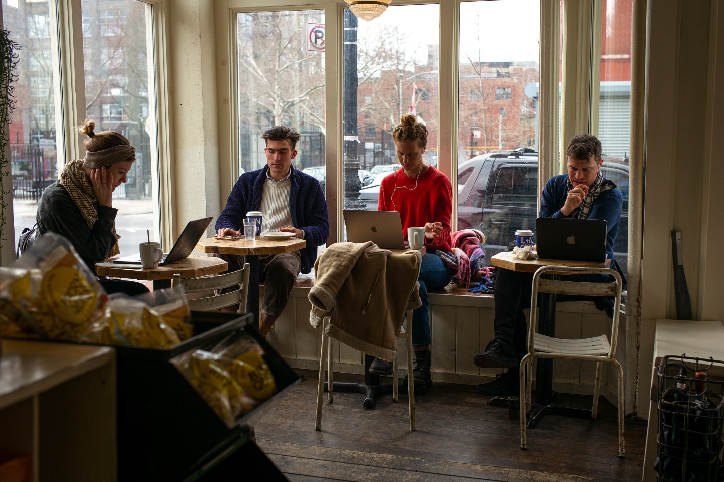 Patrons at the Littleneck Outpost restaurant use their laptop computers in the Greenpoint, Brooklyn.