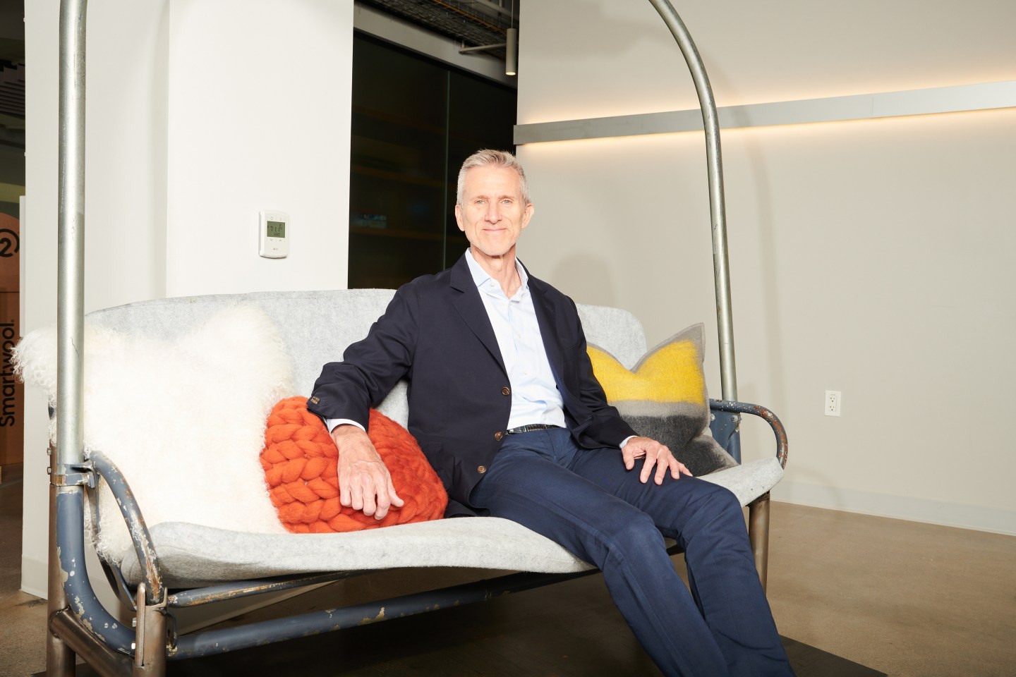 VF Corporation CEO Steve Rendle, photographed on a real ski lift chair from the Steamboat Resort in Colorado at VF's Denver headquarters.
