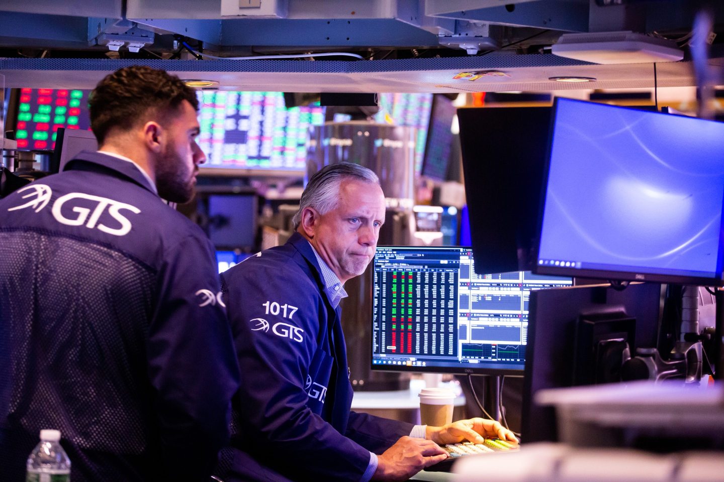 Traders on the floor of the New York Stock Exchange working.