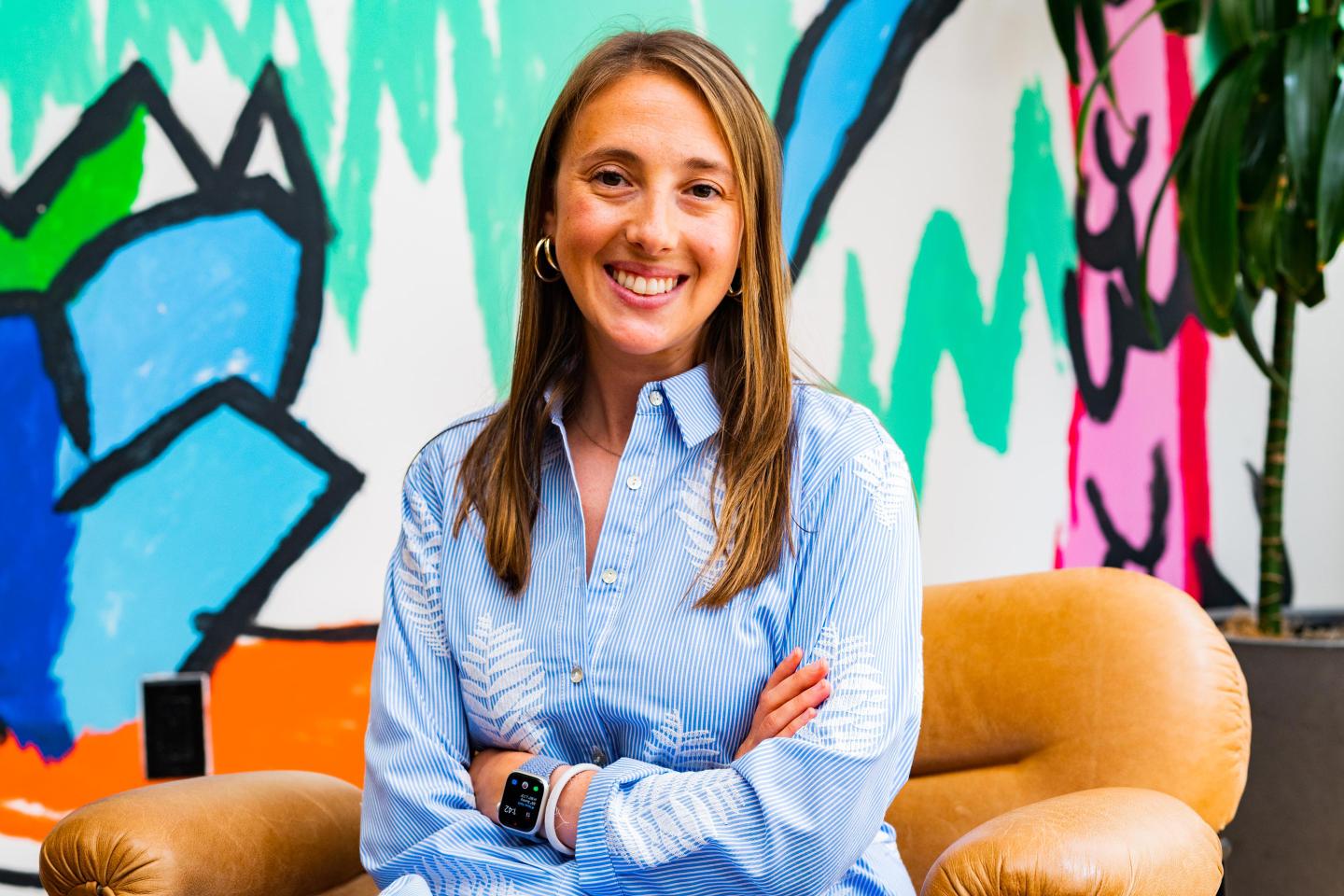 Summer Health founder Ellen DaSilva sitting in a chair.
