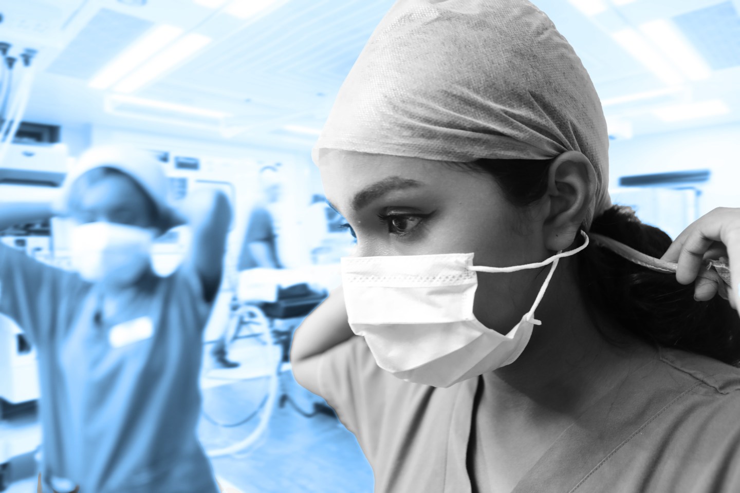 Medical professionals putting on PPE