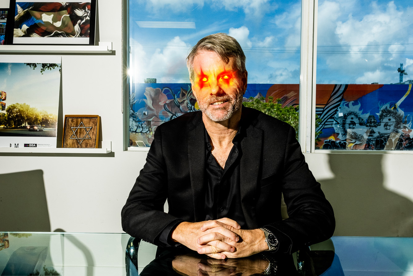 A photo illustration of Michael Saylor with laser beams out of his ideas at the Bitcoin 2021 convention in Miami, Florida on June 4, 2021.