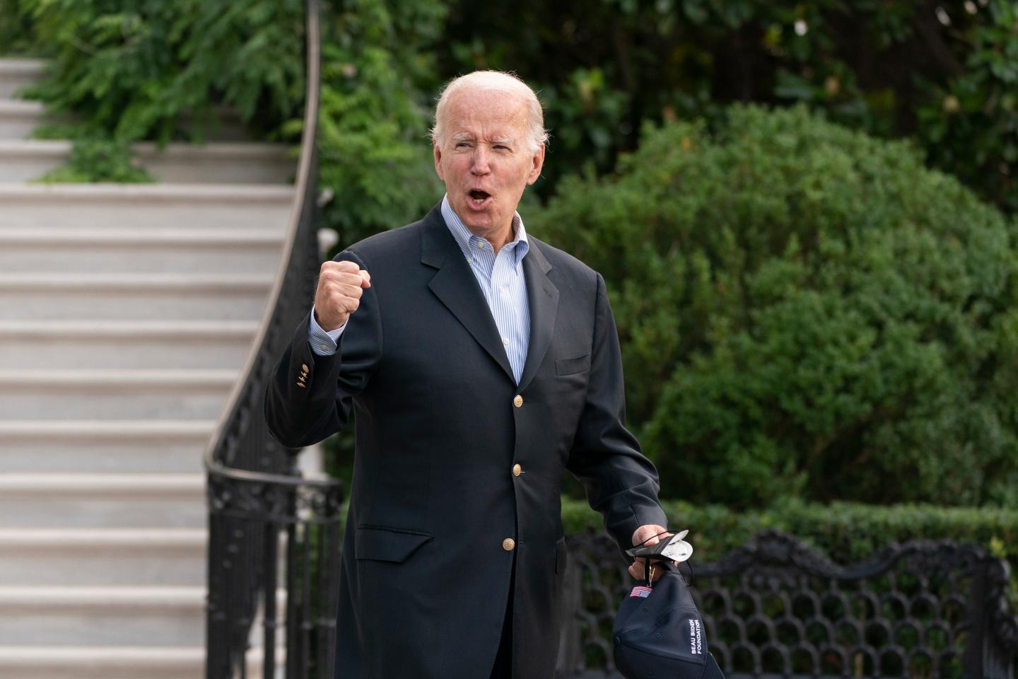 President Joe Biden responds to reporters questions as he walks to board Marine One on the South Lawn of the White House in Washington, on his way to his Rehoboth Beach, Del., home after his most recent COVID-19 isolation Aug. 7.