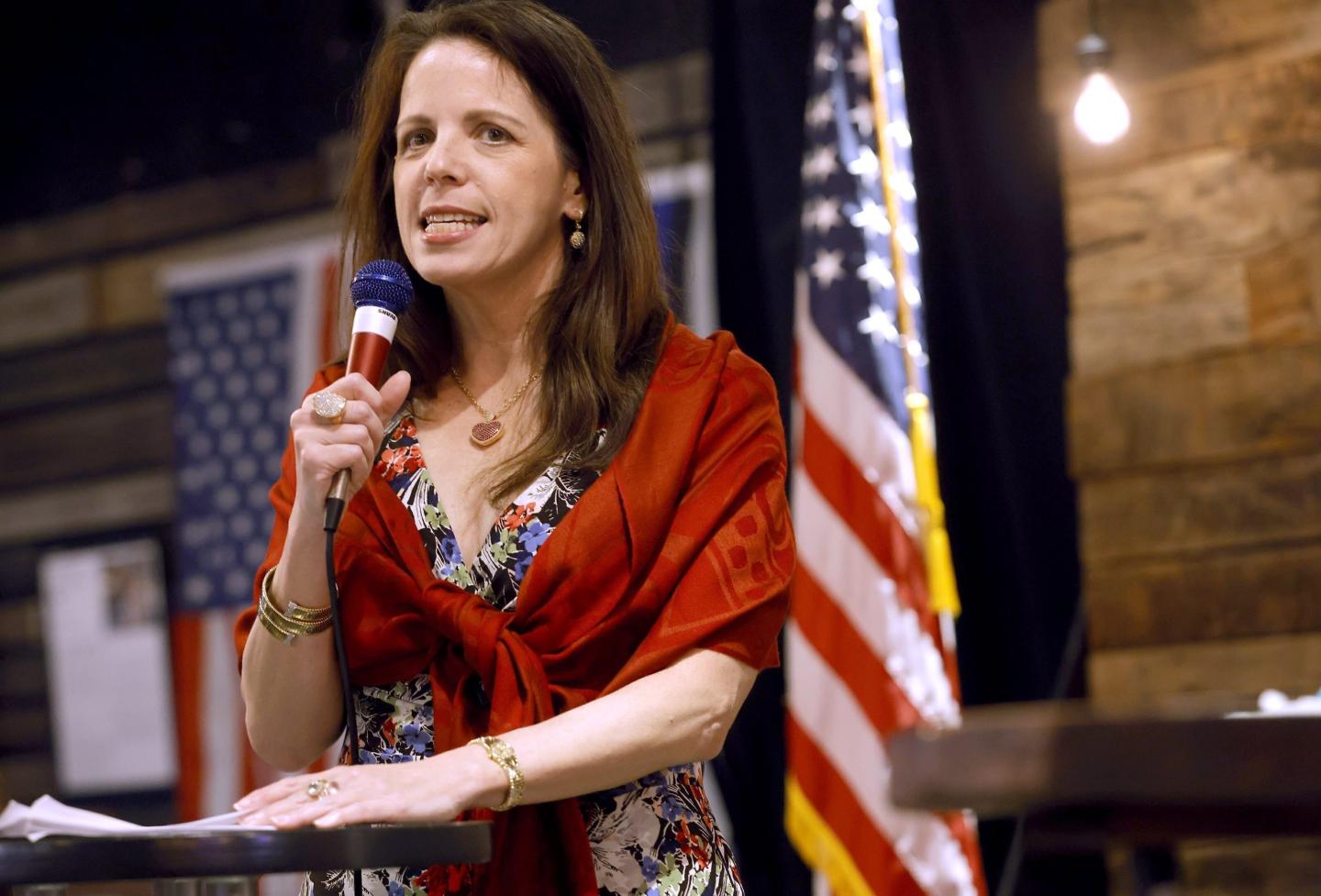 Dr. Simone Gold speaks to a large crowd inside The Elephant in the Room in Jenks during a Frontline Doctor's Uncensored Truth Tour event on June 30, 2021. Gold, an anti-vaccine medical doctor who pleaded guilty to illegally entering the Capitol, founded a nonprofit that raised more than $430,000 for her legal expenses. The fundraising appeal by Gold’s group, America’s Frontline Doctors, didn’t mention her guilty plea, prosecutors noted.