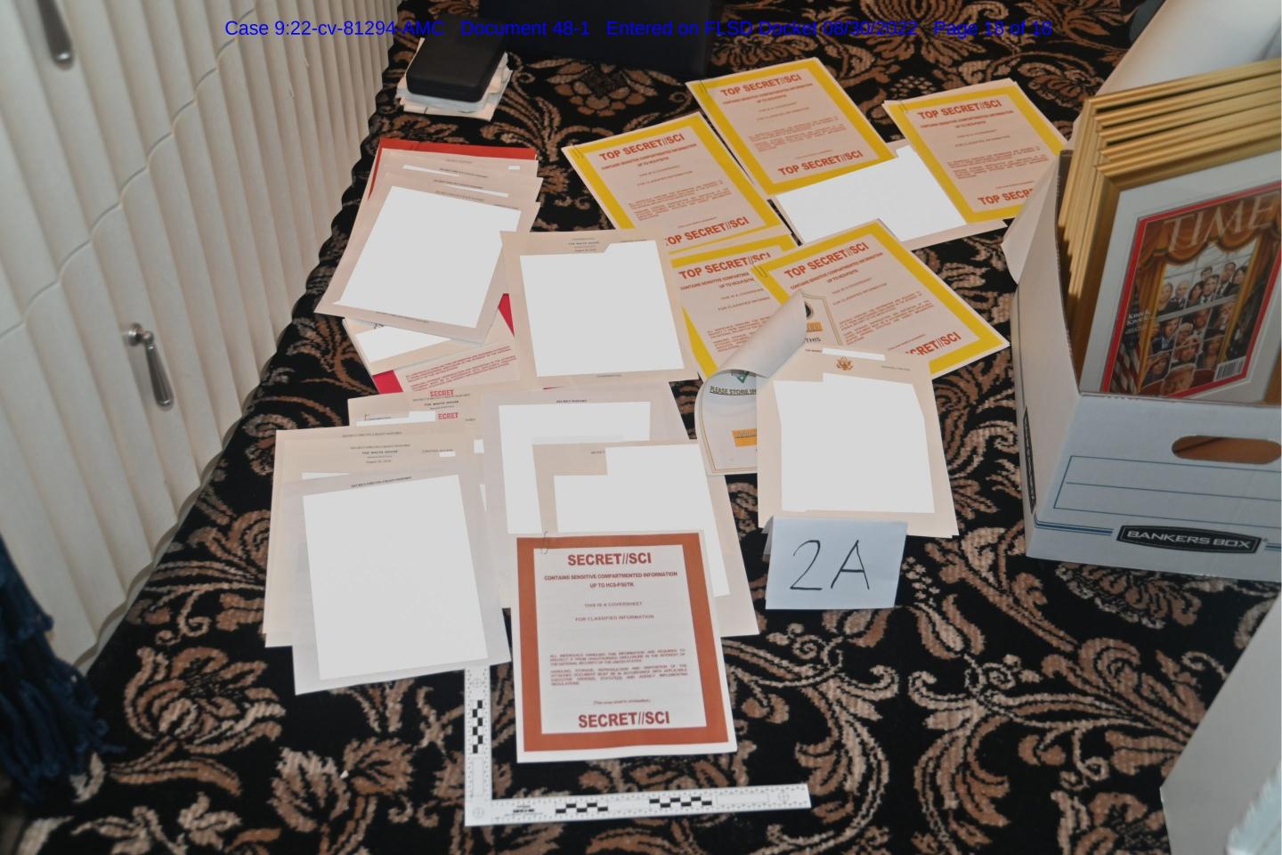Photo of classified documents piled on Trump carpet adds to Justice Department’s pressure
