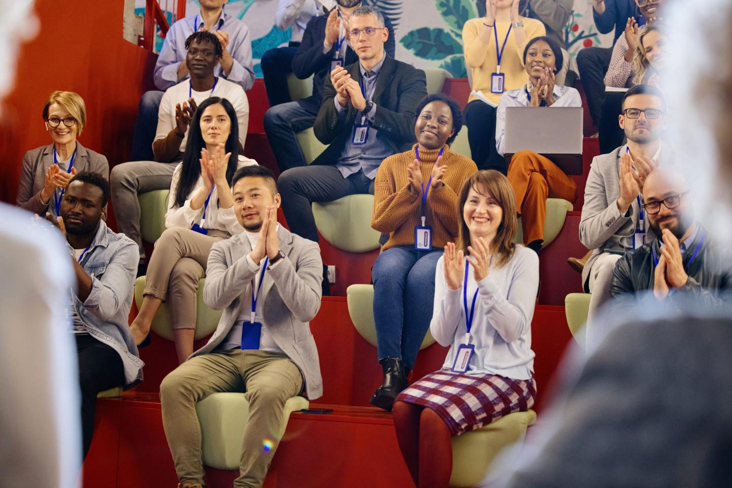 Group of colleagues applaud