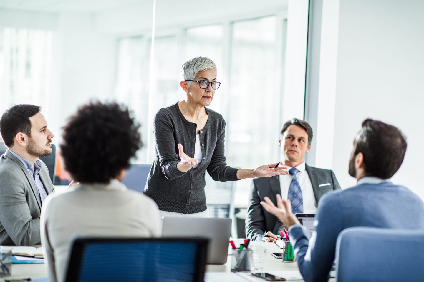Leaders gathered around table