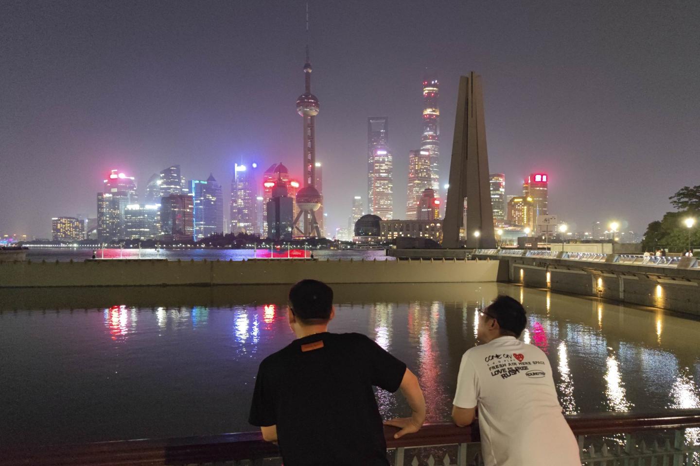 Tourists look over Shanghai.